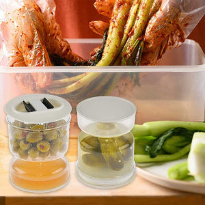 Pickle and olive glass container with strainer