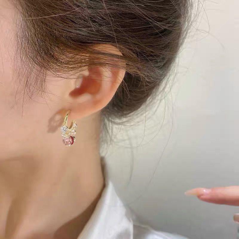 Goldene glitzernde bunte Zirkonohrringe