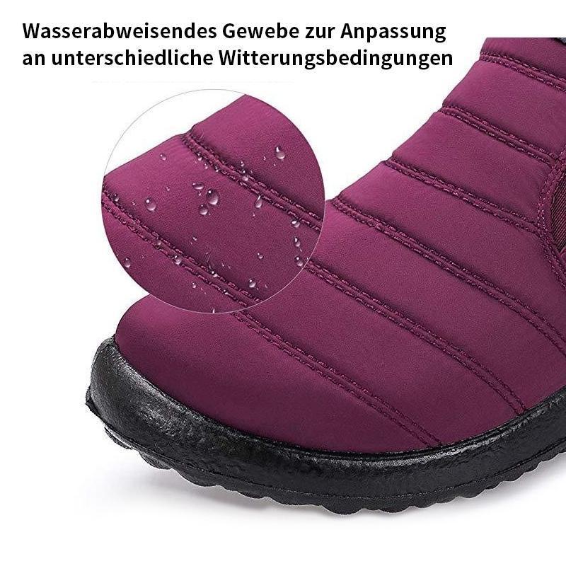 Männliche und weibliche Paare Schneeschuhe