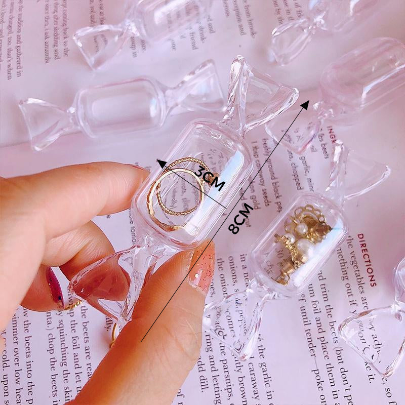 Transparente Schmuckschatulle in Bonbonform